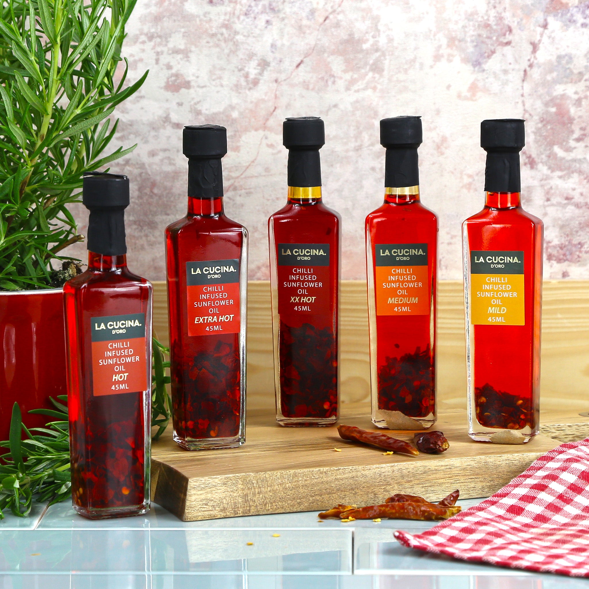 A set of five chilli oils of increasing heat levels